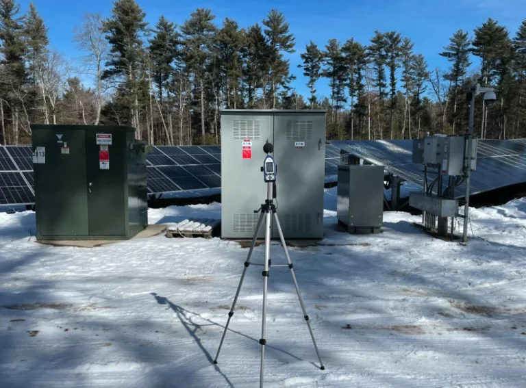 Sound level meter near a solar farm. Image: Acentech.