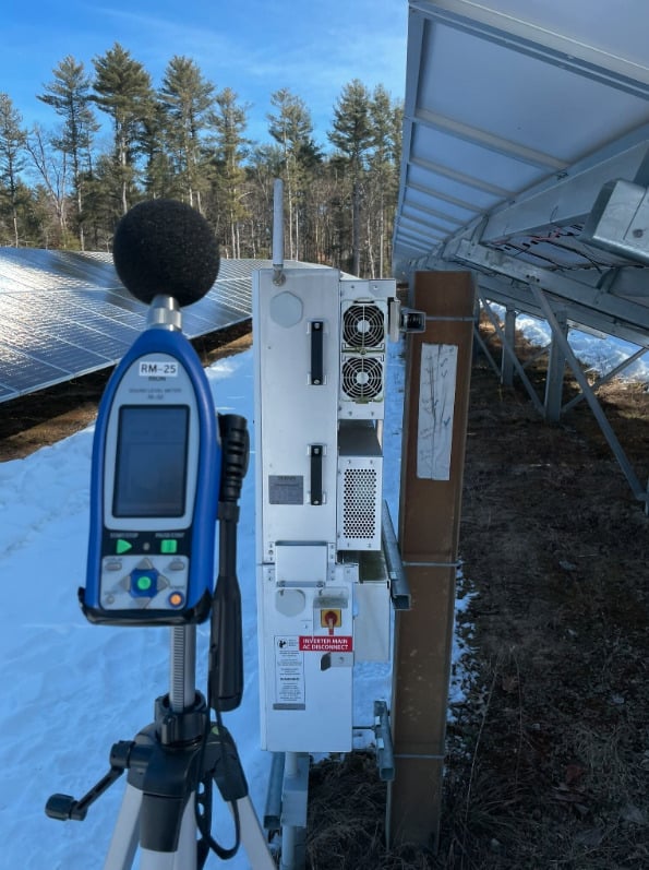 Sound level meter near an inverter. Image: Acentech